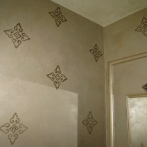 Shimmery plaster with medallion stencil
